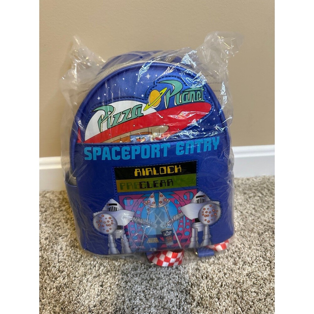 Loungefly Disney Pixar Toy Story Pizza Planet Backpack NEW in packaging.